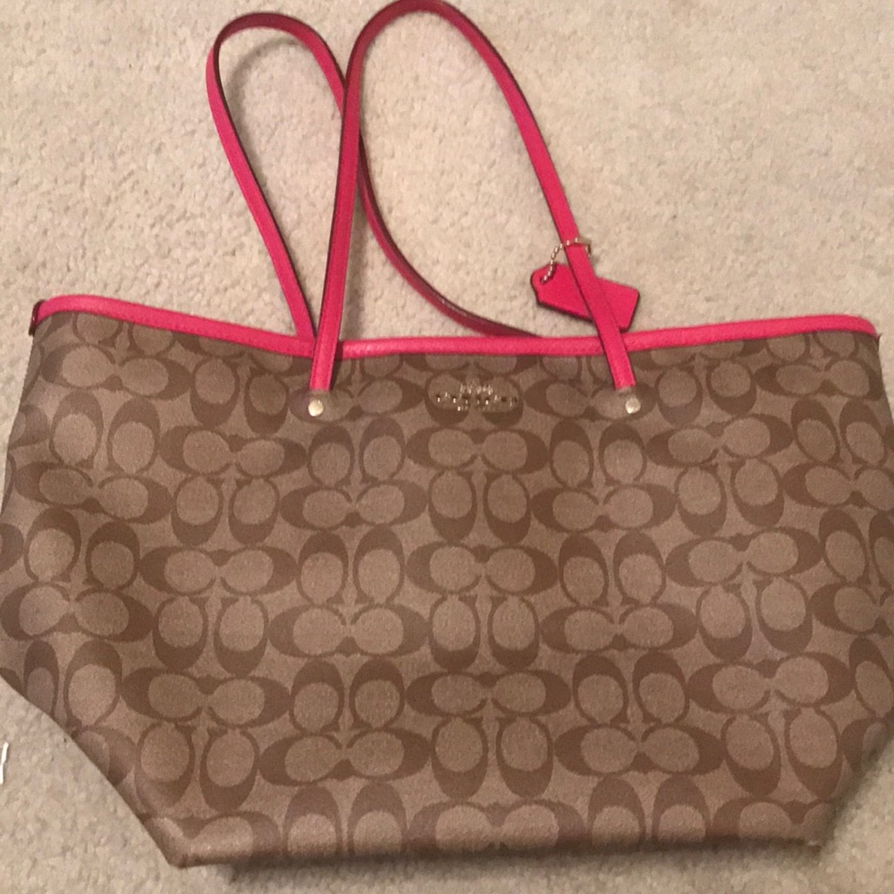 Bright pink & tan coach bag